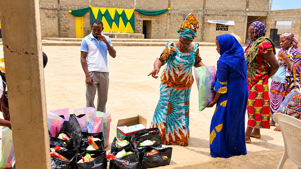 Community Food Distribution Courtyard, a Funke Adeyemo Foundation community outreach photograph.